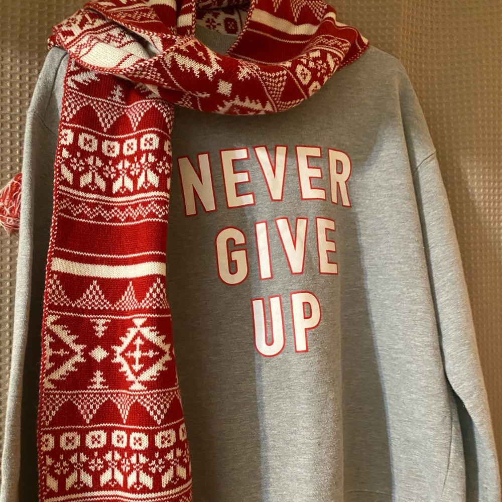 Women’s sweater with a scarf added also